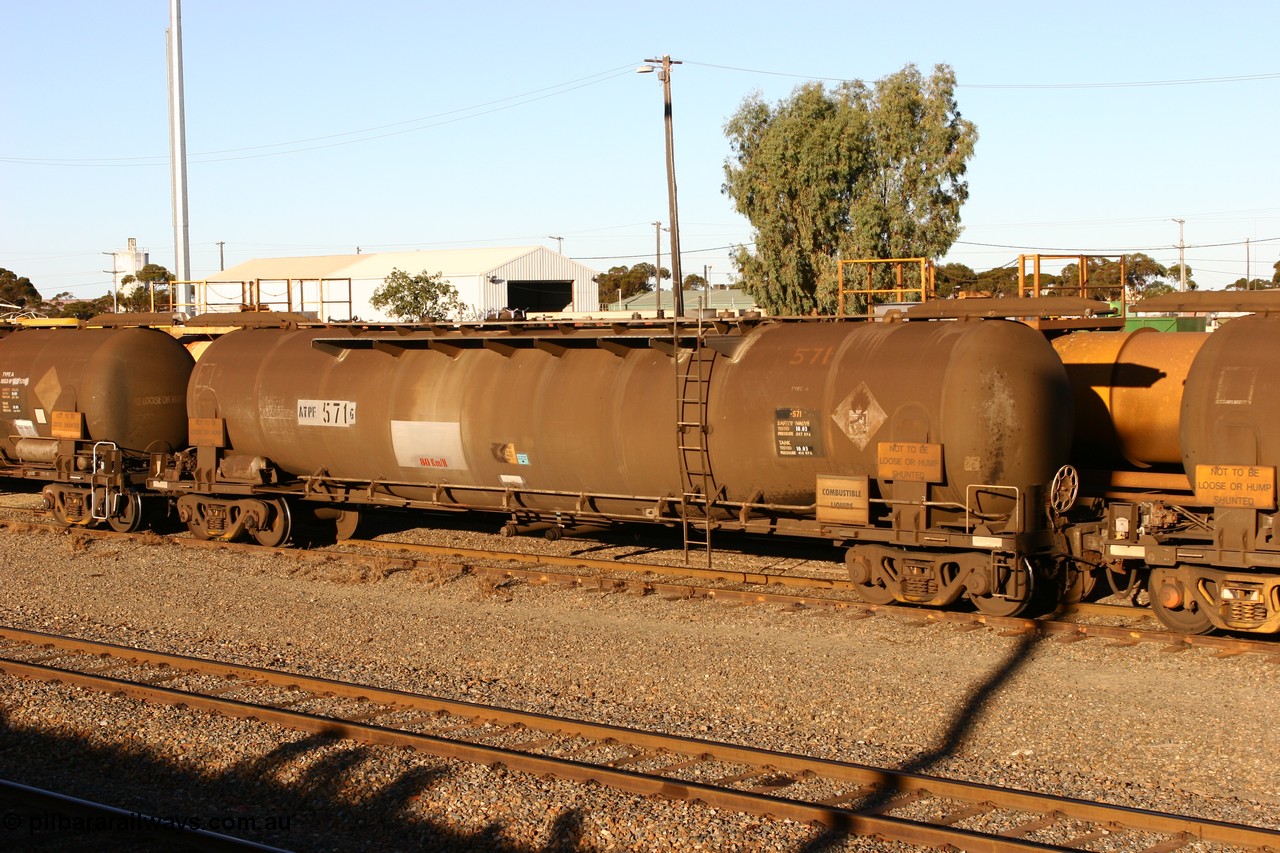 060528 4663
West Kalgoorlie, ATPF 571 fuel tank waggon is the type leader built by WAGR Midland Workshops in 1974 for Shell as WJP type 80.66 kL one compartment one dome, capacity of 80500 litres.
Keywords: ATPF-type;ATPF571;WAGR-Midland-WS;WJP-type;
