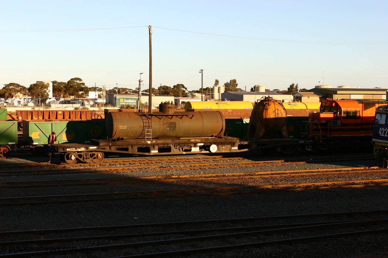 060528 4679
West Kalgoorlie, AZWY 30373 'Sputnik' loco oil and sand waggon, originally built as an WFX type flat waggon by Tomlinson Steel in a batch of one hundred and sixty one in 1969-70. Recoded to WQCX type in 1980 and to WSP type waste oil and sand waggon in 1986.
Keywords: AZWY-type;AZWY30373;Tomlinson-Steel-WA;WFX-type;WQCX-type;WSP-type;