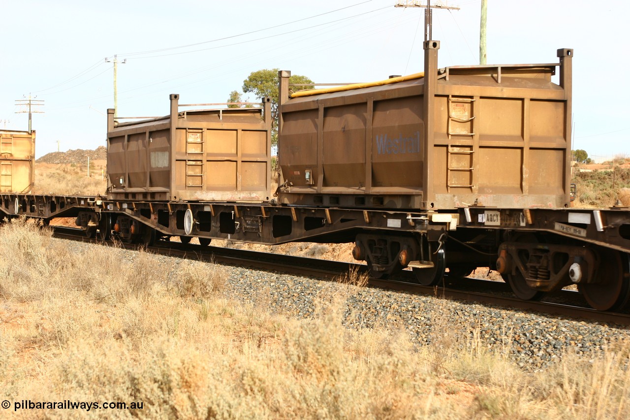 060531 4981
West Kalgoorlie, AQCY with two Westrail COR type roll top containers usually carting sulphur on this Murrin Murrin or Malcolm freighter service.
Keywords: AQCY-type;WAGR-Midland-WS;WFX-type;