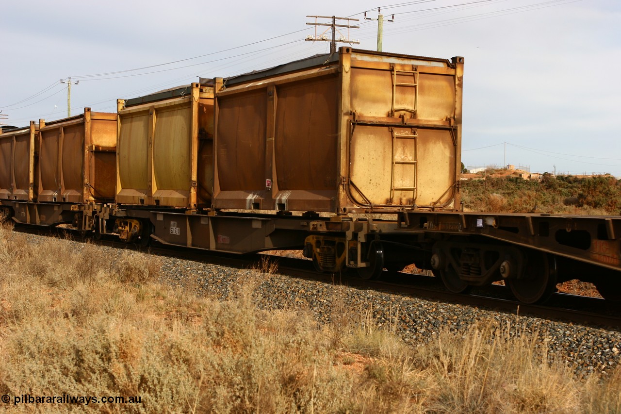 060531 4982
West Kalgoorlie, AQNY 32153 one of sixty two waggons built by Goninan WA in 1998 as WQN type for Murrin Murrin container traffic with two original style sulphur containers S155 and an unnumbered one with sliding tarpaulin roofs.
Keywords: AQNY-type;AQNY32153;Goninan-WA;WQN-type;