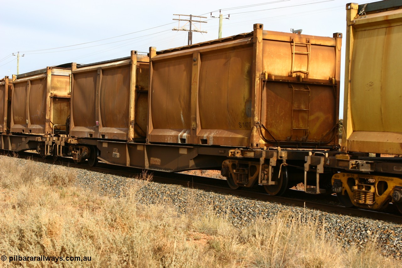 060531 4983
West Kalgoorlie, AQNY 32183 one of sixty two waggons built by Goninan WA in 1998 as WQN type for Murrin Murrin container traffic, with a pair of loaded sulphur skips with original door and sliding tarpaulins.
Keywords: AQNY-type;AQNY32183;Goninan-WA;WQN-type;