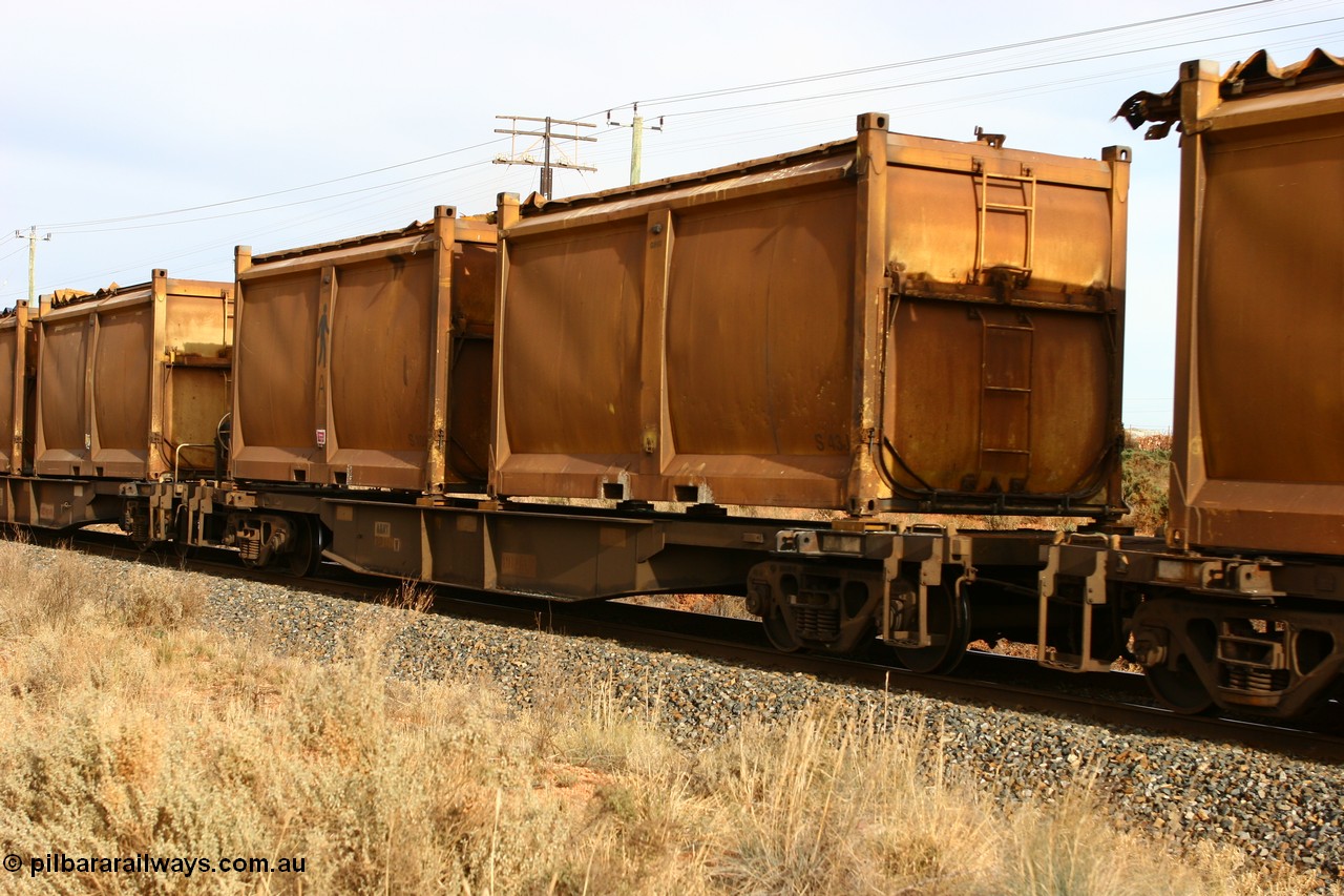 060531 4986
West Kalgoorlie, AQNY 32176 one of sixty two waggons built by Goninan WA in 1998 as WQN type for Murrin Murrin container traffic, with sulphur skips S43 and S103 with original door and sliding tarpaulins.
Keywords: AQNY-type;AQNY32176;Goninan-WA;WQN-type;