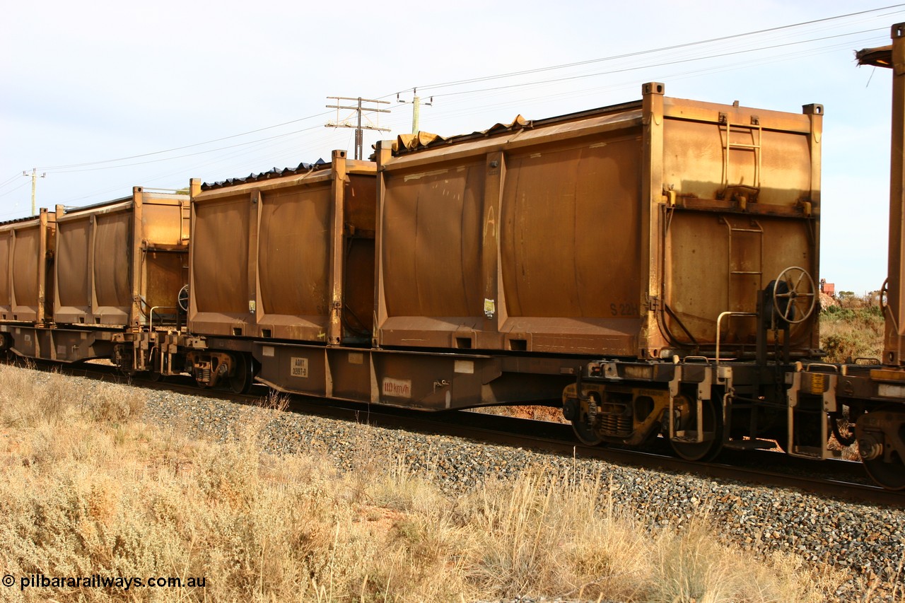 060531 4987
West Kalgoorlie, AQNY 32197 one of sixty two waggons built by Goninan WA in 1998 as WQN type for Murrin Murrin container traffic, with sulphur skips S22 and S10 with original door and sliding tarpaulins.
Keywords: AQNY-type;AQNY32197;Goninan-WA;WQN-type;