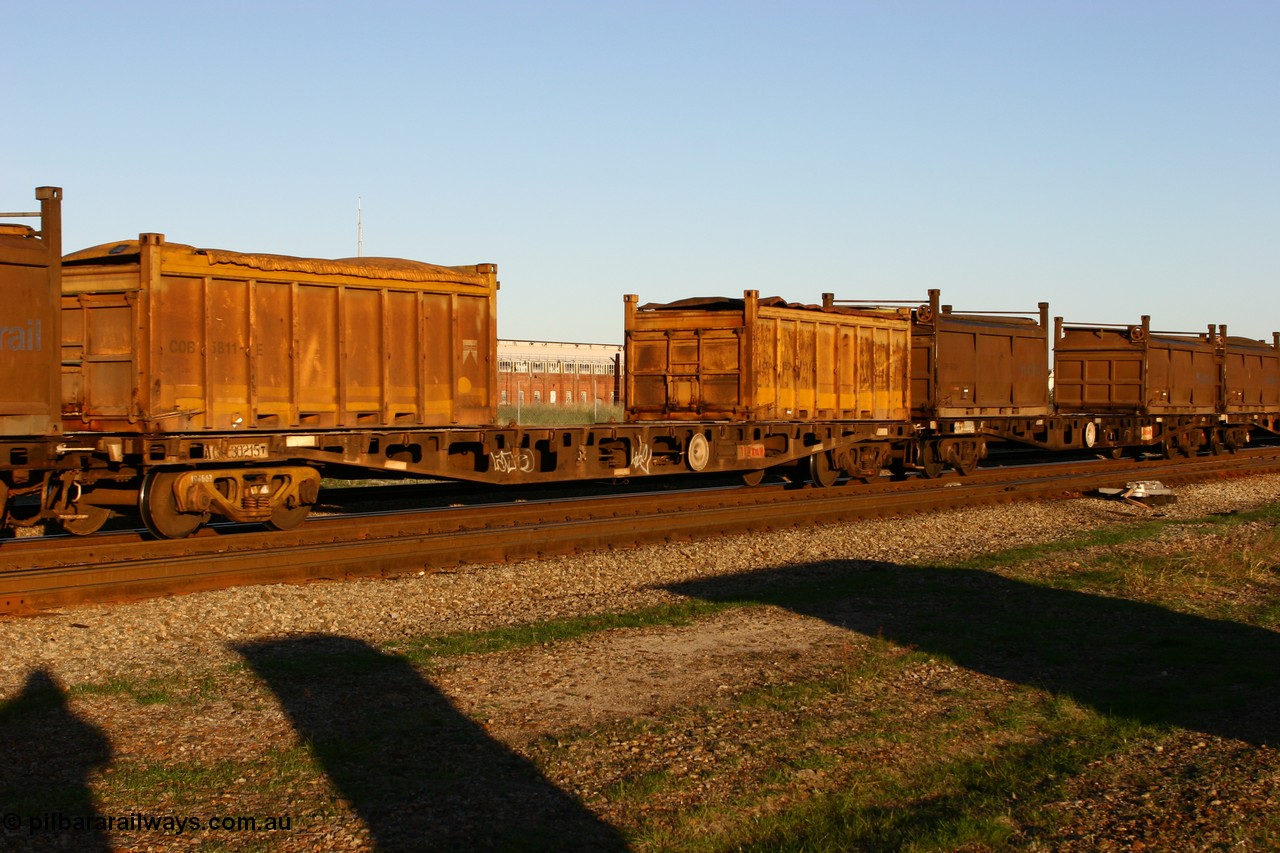 060603 5247
Midland, AQCY 30215 container flat waggon built by WAGR Midland Workshops in 1974 part of a batch of forty five WFX type container flat waggons, in 1980 recoded to WQCX loaded with two Westrail roll top containers COA type 5157 and COB type 5811.
Keywords: AQCY-type;AQCY30215;WAGR-Midland-WS;WFX-type;WQCX-type;