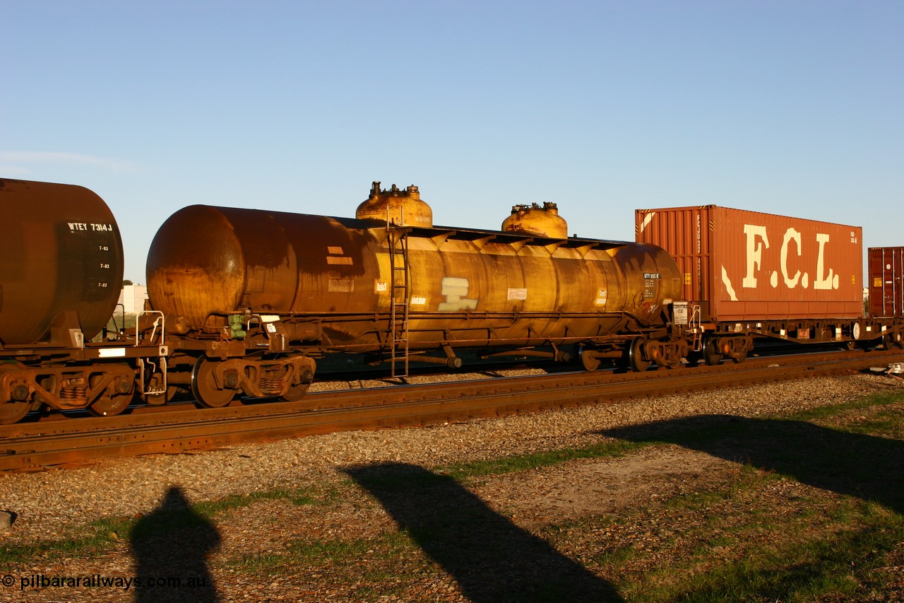 060603 5250 ATTY30674F
Midland, ATTY 30674 fuel tank waggon, one of five built by AE Goodwin NSW in 1970 as WST class, recoded to WSTY and then ATTY. 78600 litre capacity.
Keywords: ATTY-type;ATTY30674;AE-Goodwin;WST-type;WSTY-type;