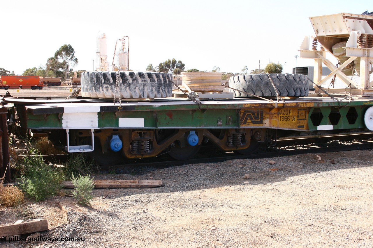 070527 9175
Parkeston, AZQF 1966 heavy weight waggon, originally built by Commonwealth Railways Port Augusta Workshops in November 1966, issued as 1966, coded Q, then later to AZQF, fitted with narrow gauge rails on deck for conveyance of rollingstock between Port Augusta and Marree. View of six wheel bogie and code board.
Keywords: AZQF-type;AZQF1966;CR-Port-Augusta-WS;Q-type;