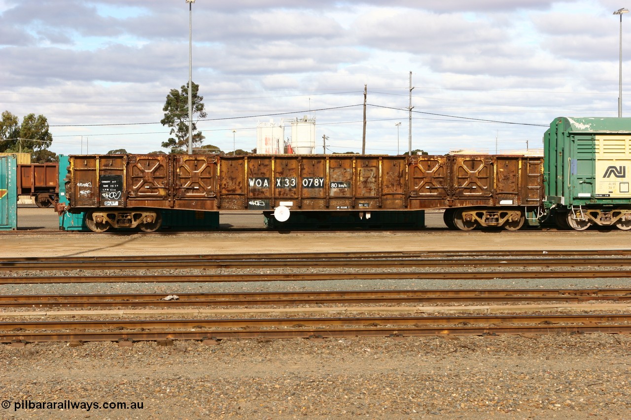 070527 9220
West Kalgoorlie, WOAX 33078 open waggon originally built by WAGR Midland Workshops in a batch of one hundred WG type open waggons in 1966-67, recoded to WGX in 1969, in 1970 converted to WGS type for superphosphate traffic, in 1980 recoded to WOAX.
Keywords: WOAX-type;WOAX33078;WAGR-Midland-WS;WGX-type;WGS-type;