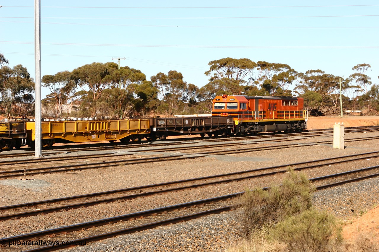 070529 9327
West Kalgoorlie, WGLA 30027 originally built by WAGR Midland Workshops in 1965 as WF type bogie flat waggon, to WFW in 1974, then converted to bagged nickel matte traffic WGLA type in 1984 and WGL 632 originally one of three units built by Westrail Midland Workshops in 1976-7 as WGL type bogie flat waggon for Western Mining Corporation for bagged nickel matte traffic.
Keywords: WGLA-type;WGLA30027;WAGR-Midland-WS;WF-type;WFW-type;WFDY-type;