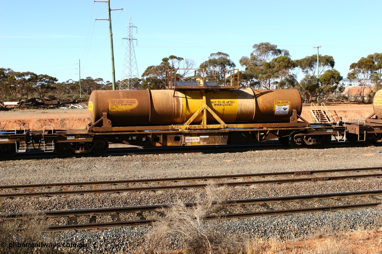 070529 9336
West Kalgoorlie, AQHY 30053 with sulphuric acid tank CSA 0039, originally built by the WAGR Midland Workshops in 1964/66 as a WF type flat waggon, then in 1997, following several recodes and modifications, was one of seventy five waggons converted to the WQH type to carry CSA sulphuric acid tanks between Hampton/Kalgoorlie and Perth/Kwinana.
Keywords: AQHY-type;AQHY30053;WAGR-Midland-WS;WF-type;WFDY-type;WFDF-type;RFDF-type;WQH-type;