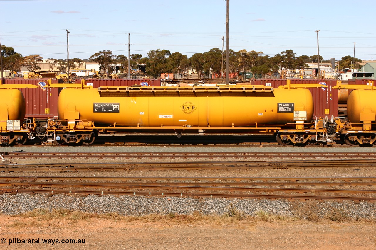 070529 9408
West Kalgoorlie, ATBY 14590 fuel tank waggon built by Westrail Midland Workshops in a batch of nine in 1981-82 for Bain Leasing Pty Ltd as type JPB, 82,000 litres for narrow gauge, recoded to JPBA in 1986, converted to standard gauge as WJPB.
Keywords: ATBY-type;ATBY14590;Westrail-Midland-WS;JPB-type;JPBA-type;WJPB-type;