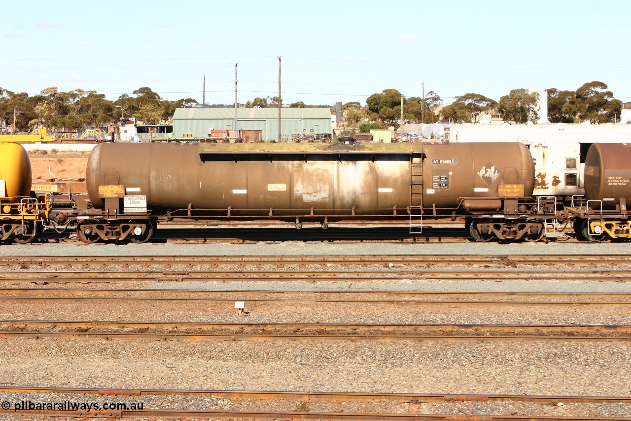 070529 9414
West Kalgoorlie, ATPY 602, fuel tanker, built by WAGR Midland Workshops in 1976 as WJP class for BP Oil, capacity of 80500 litres.
Keywords: APTY-type;ATPY602;Westrail-Midland-WS;WJP-type;WJPY-type;