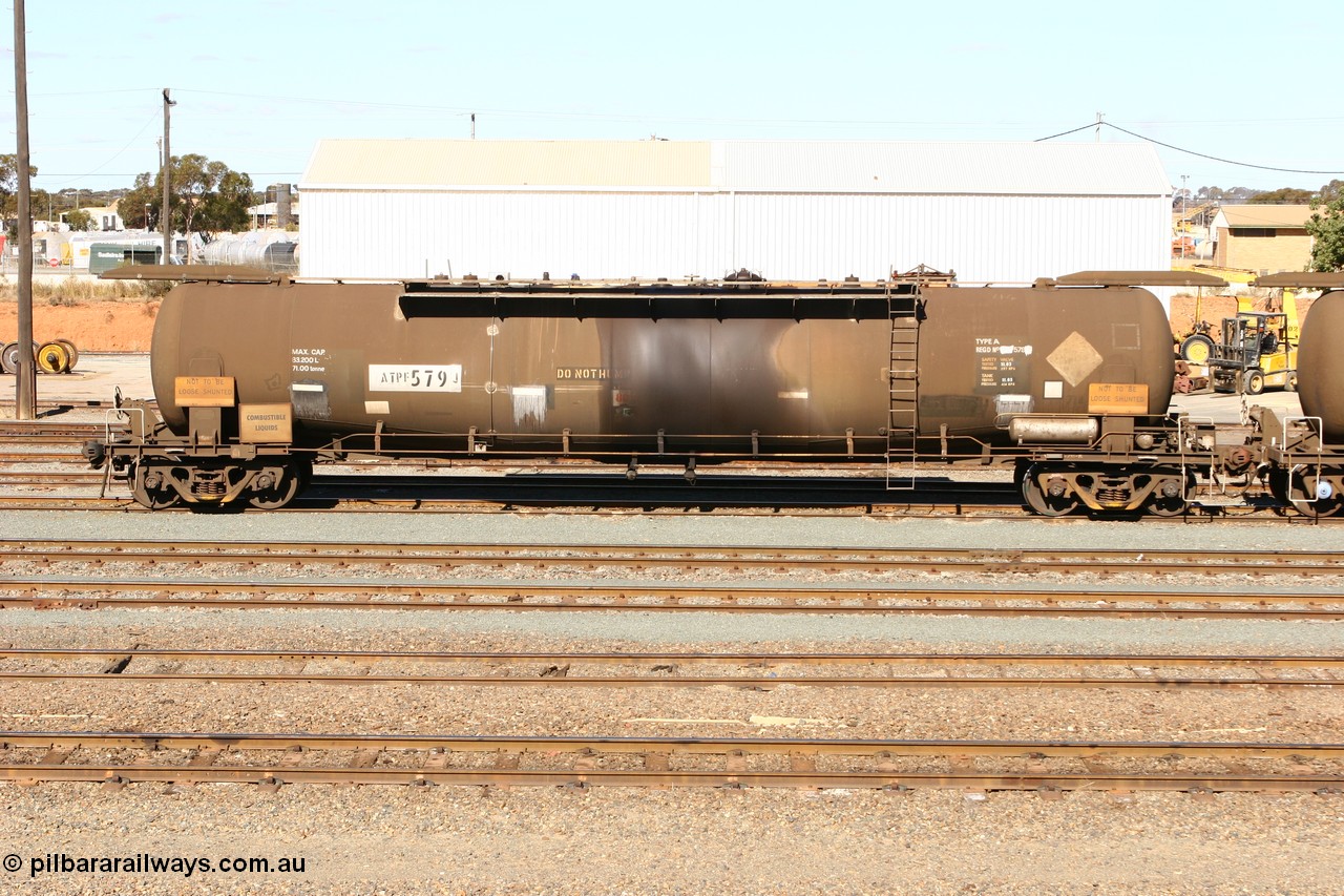 070529 9418
West Kalgoorlie, ATPF 579 fuel tank waggon built by WAGR Midland Workshops 1974 for Shell as WJP type 80.66 kL one compartment one dome, fitted with type F InterLock couplers.
Keywords: ATPF-type;ATPF579;WAGR-Midland-WS;WJP-type;