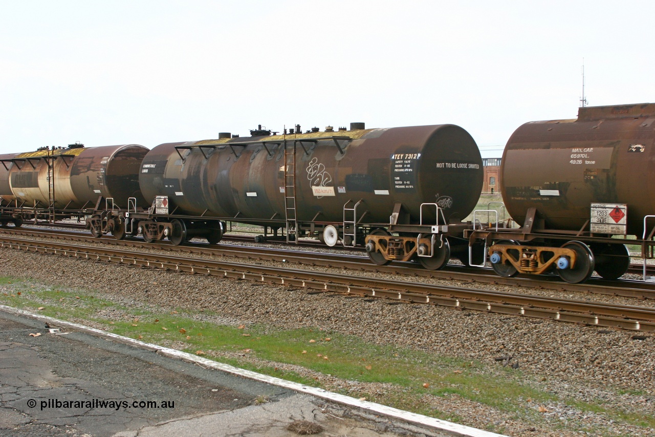 070608 0110
Midland, ATEY 7312 fuel tank waggon, ex NSW and former NTAF in service carting petrol for BP Oil, former AMPOL tank, coded WTEY when arrived in WA.
Keywords: ATEY-type;ATEY7312;NTAF-type;WTEY-type;