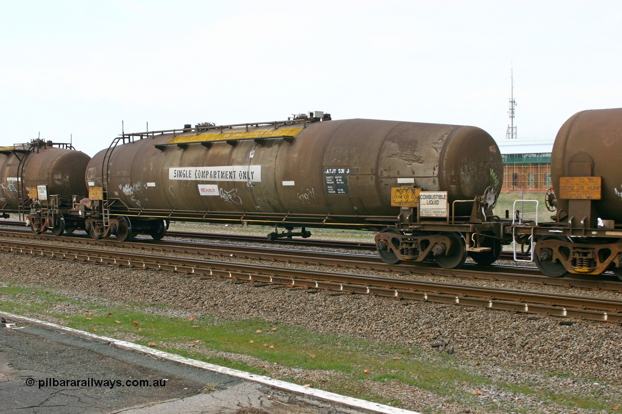 070608 0113
Midland, ATJY 531 fuel tank waggon built by Comeng NSW in 1971 for AMPOL, the same as a sister tank built at the same time for Caltex both as WJJ type two compartment two dome. Seen here in service with Caltex. 91,000 litres now single compartment.
Keywords: ATJY-type;ATJY531;Comeng-NSW;WJJ-type;