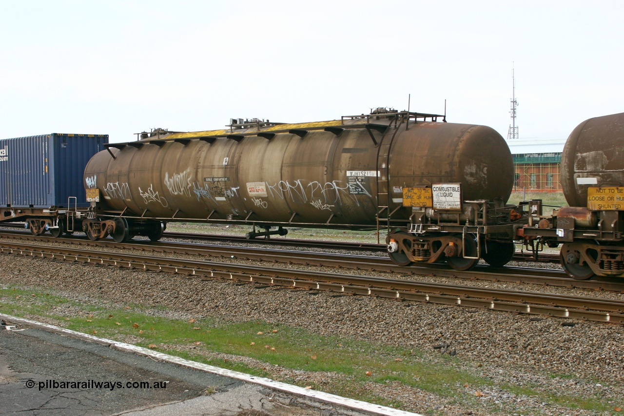 070608 0114
Midland, WJHY 521, leader of two WJH type fuel tank waggons built by Comeng NSW in 1971 for Caltex with a 90,000 litre capacity three compartment and three domes, now a single compartment unit and still with Caltex.
Keywords: WJHY-type;WJHY521;Comeng-NSW;WJH-type;