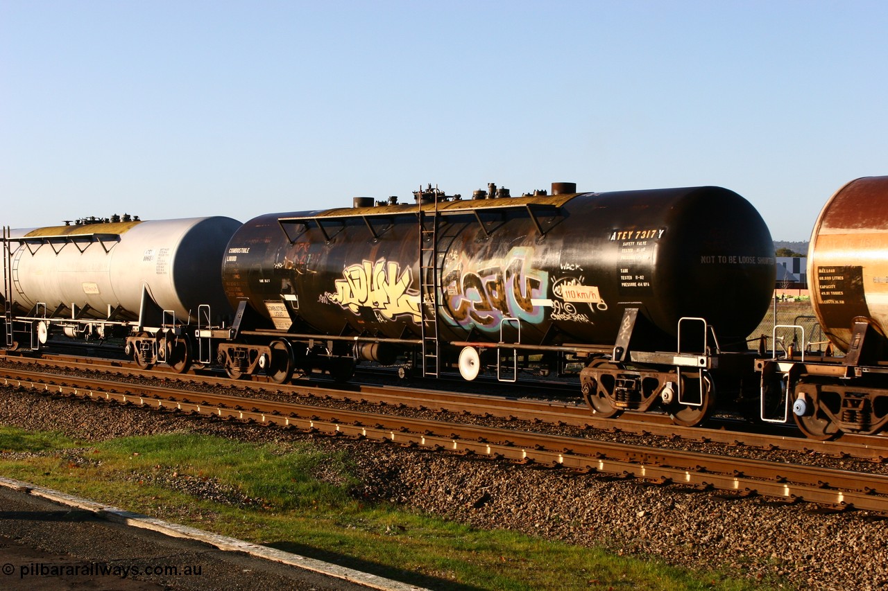 070609 0192
Midland, ATEY 7317 diesel fuel tank waggon in service for BP Oil, former NSW AMPOL NTAF tank, coded WTEY when arrived in WA.
Keywords: ATEY-type;ATEY7317;NTAF-type;WTEY-type;