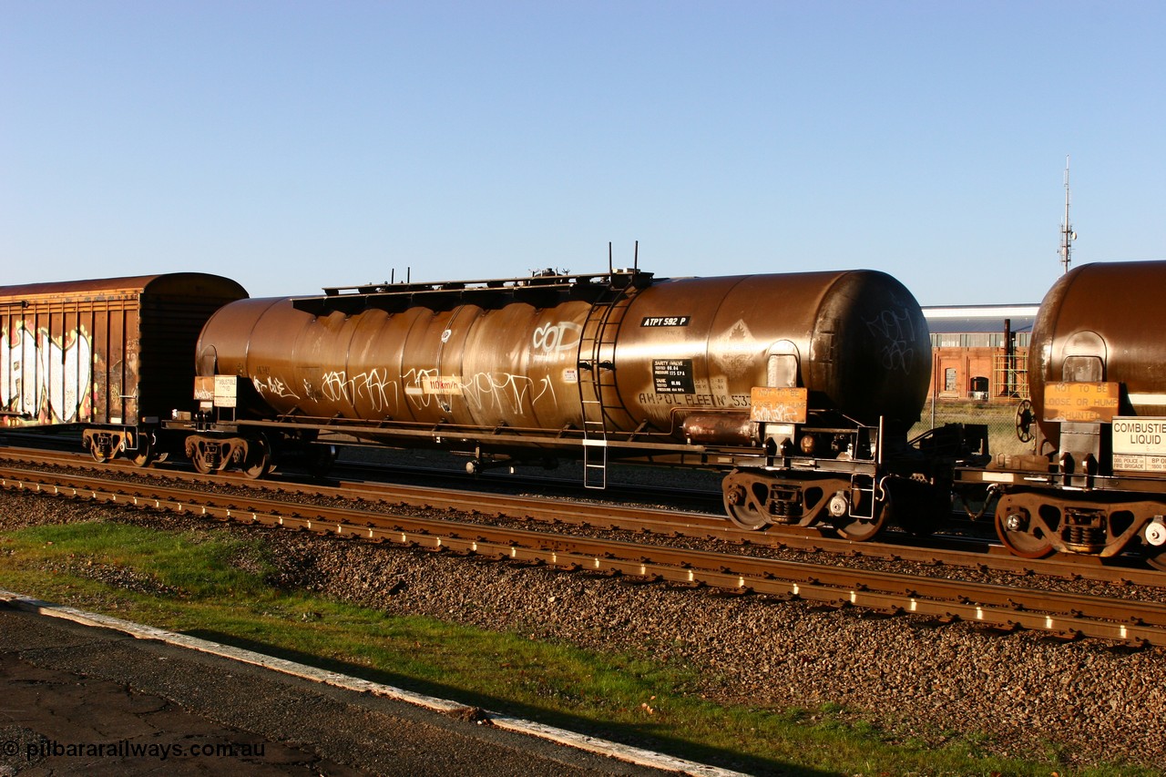 070609 0201
Midland, ATPY 592 fuel tank waggon built by WAGR Midland Workshops in 1976 as one of four WJP type for AMPOL, capacity of 80500 litres, here in Caltex service.
Keywords: ATPY-type;ATPY592;WAGR-Midland-WS;WJP-type;WJPY-type;