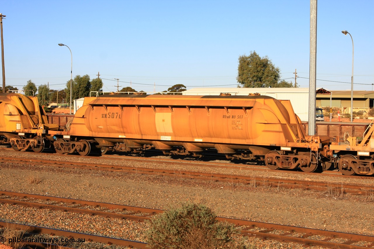 100601 8483
West Kalgoorlie, WN 507, pneumatic discharge nickel concentrate waggon, one of thirty units built by AE Goodwin NSW as WN type in 1970 for WMC.
Keywords: WN-type;WN507;AE-Goodwin;