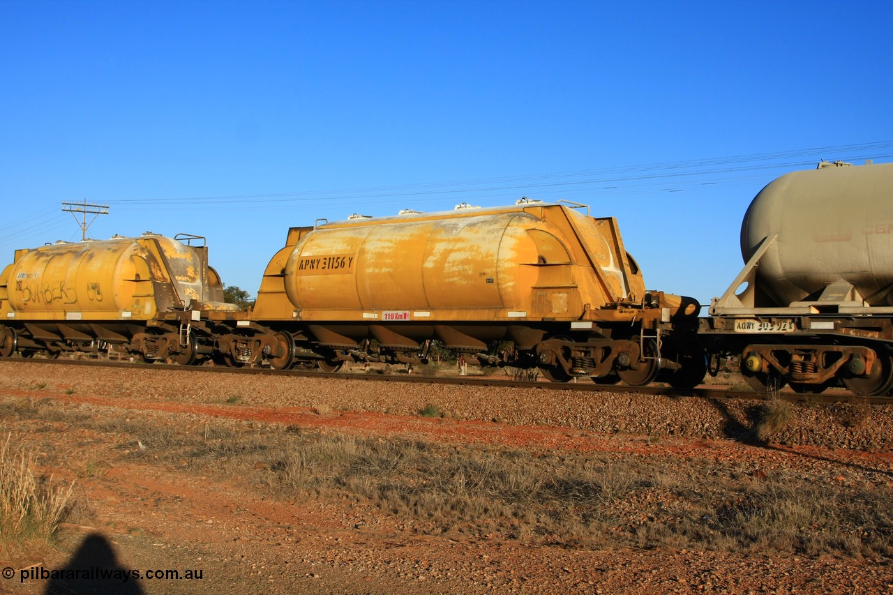 100601 8518
Parkeston, APNY 31156, one of twelve units built by WAGR Midland Workshops in 1974 as WNA type pneumatic discharge nickel concentrate waggon, WAGR units built and owned copies of the AE Goodwin units built WN waggons for WMC.
Keywords: APNY-type;APNY31156;WAGR-Midland-WS;WNA-type;