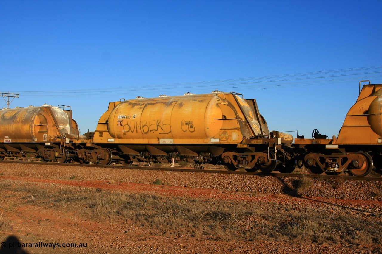 100601 8519
Parkeston, APNY 31162, final one of twelve units built by WAGR Midland Workshops in 1974 as WNA type pneumatic discharge nickel concentrate waggon, WAGR units built and owned copies of the AE Goodwin units built WN waggons for WMC.
Keywords: APNY-type;APNY31162;WAGR-Midland-WS;WNA-type;