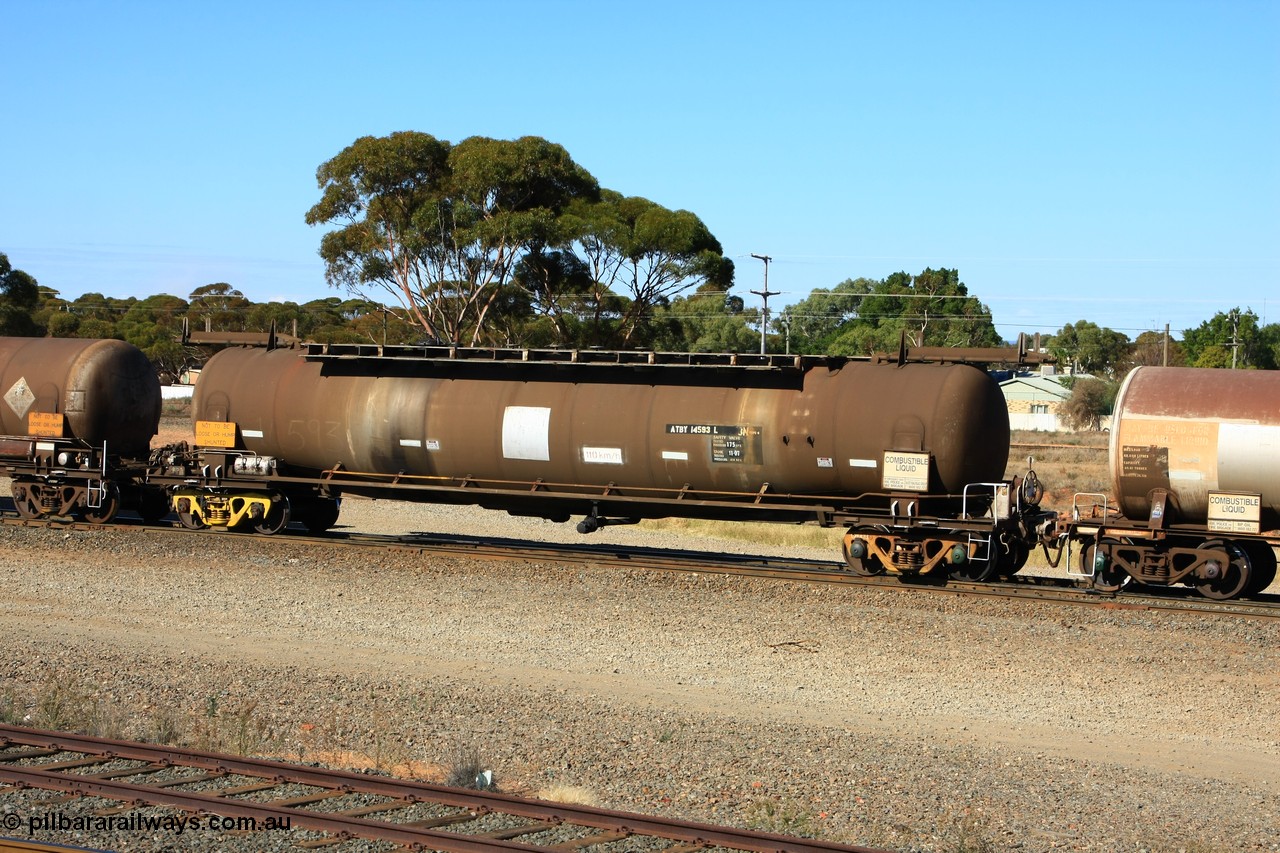 100602 8597
West Kalgoorlie, ATBY 14593 fuel tanker, one of nine JPB type tankers built for Bain Leasing Pty Ltd by Westrail Midland Workshops in 1981/82 for narrow gauge recoded to JPBA, converted to standard gauge as WJPB. 82000 litre capacity, with a 75000 SF limit.
Keywords: ATBY-type;ATBY14593;Westrail-Midland-WS;JPB-type;WJPB-type;JPBA-type;