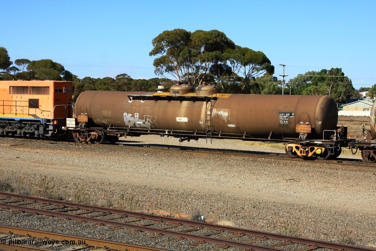 100602 8599
West Kalgoorlie, ATFY 509 fuel tank waggon built by Tulloch Ltd NSW in 1970 for Mobil WA as a WJF type, 96.24 kilolitres, 1 compartment and 2 domes. Recoded to WJFY, sold to BP Oil in 1985.
Keywords: ATFY-type;ATFY509;Tulloch-Ltd-NSW;WJF-type;WJFY-type;