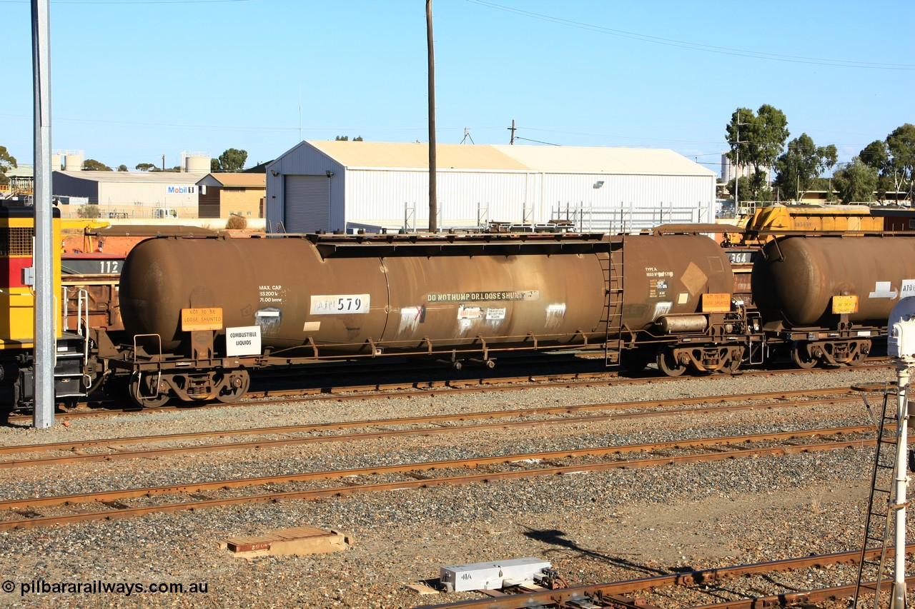 100602 8667
West Kalgoorlie, ATPF 579 fuel tank waggon built by WAGR Midland Workshops 1974 for Shell as WJP type 80.66 kL one compartment one dome, fitted with type F InterLock couplers.
Keywords: ATPF-type;ATPF579;WAGR-Midland-WS;WJP-type;