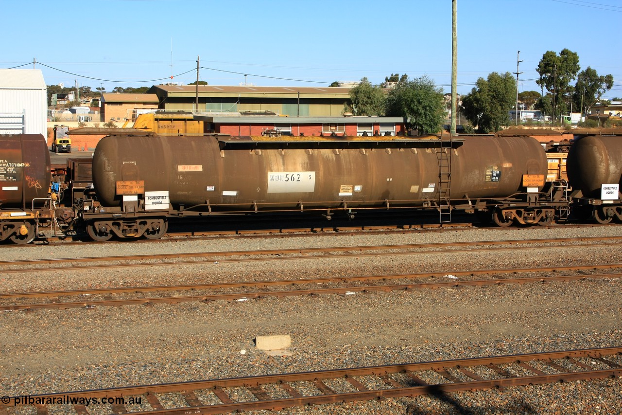100602 8671
West Kalgoorlie, ATLF 562 tank waggon, built by WAGR Midland Workshops 1973 for Shell as type WJL 86.49 kL one compartment one dome with a capacity of 80500 litres, fitted with type F InterLock couplers.
Keywords: ATLF-type;ATLF562;WAGR-Midland-WS;WJL-type;