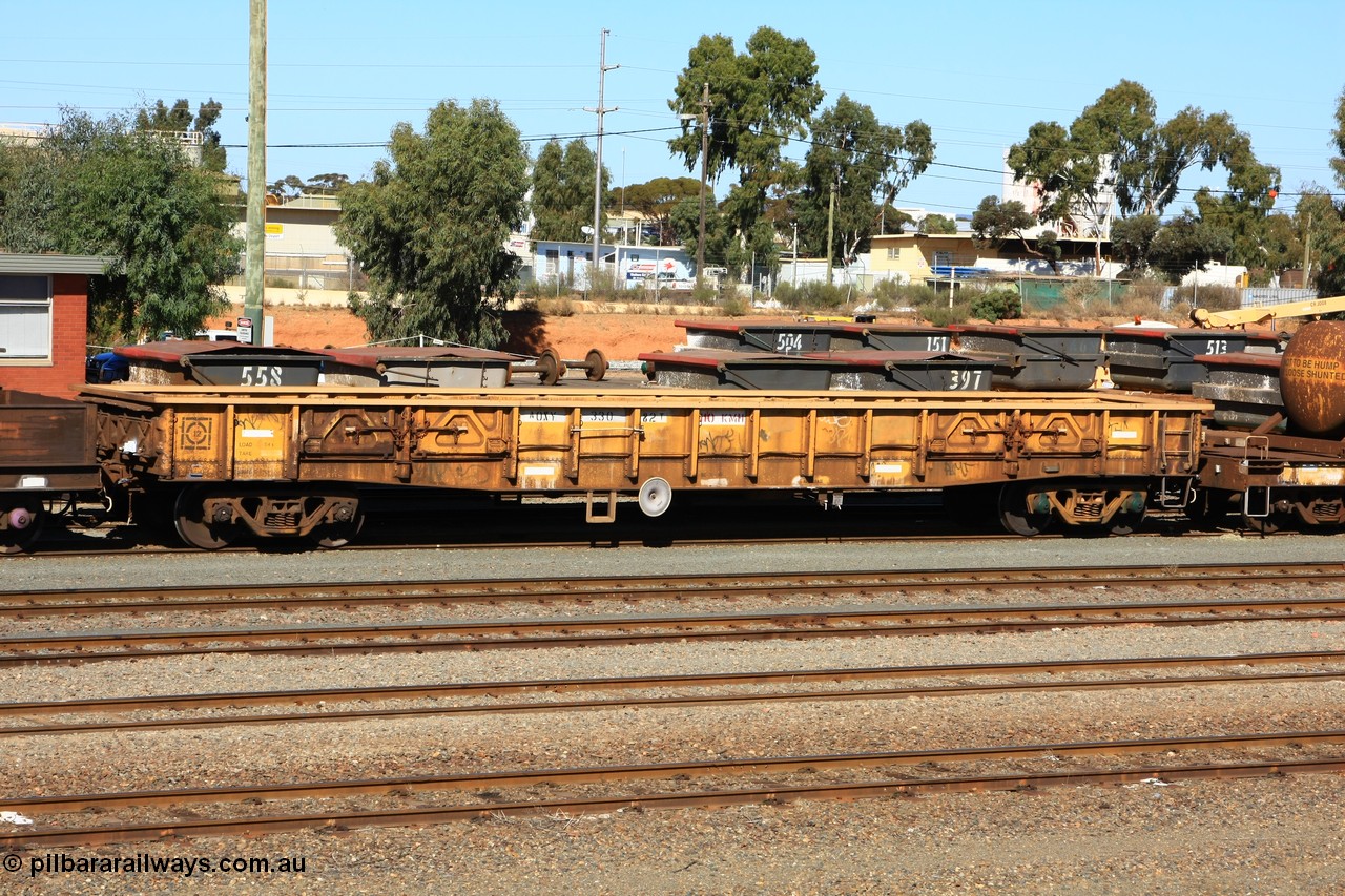 100603 8864
West Kalgoorlie, AOXY 33082, converted to carry nickel matte bulk bags, in WGL traffic. Built by WAGR Midland Workshops in 1969 as part of a batch of one hundred WG type open waggons, reclassed as a group in 1969 to WGX, to WGS for superphosphate traffic then in 1981 to WOAX, then AOAY type. [url=https://pilbararailways.com.au/gallery/displayimage.php?pid=7354]Image here of it as AOAY in 2007[/url].
Keywords: AOXY-type;AOXY33082;WAGR-Midland-WS;WG-type;WGX-type;WGS-type;WOAX-type;AOAY-type;