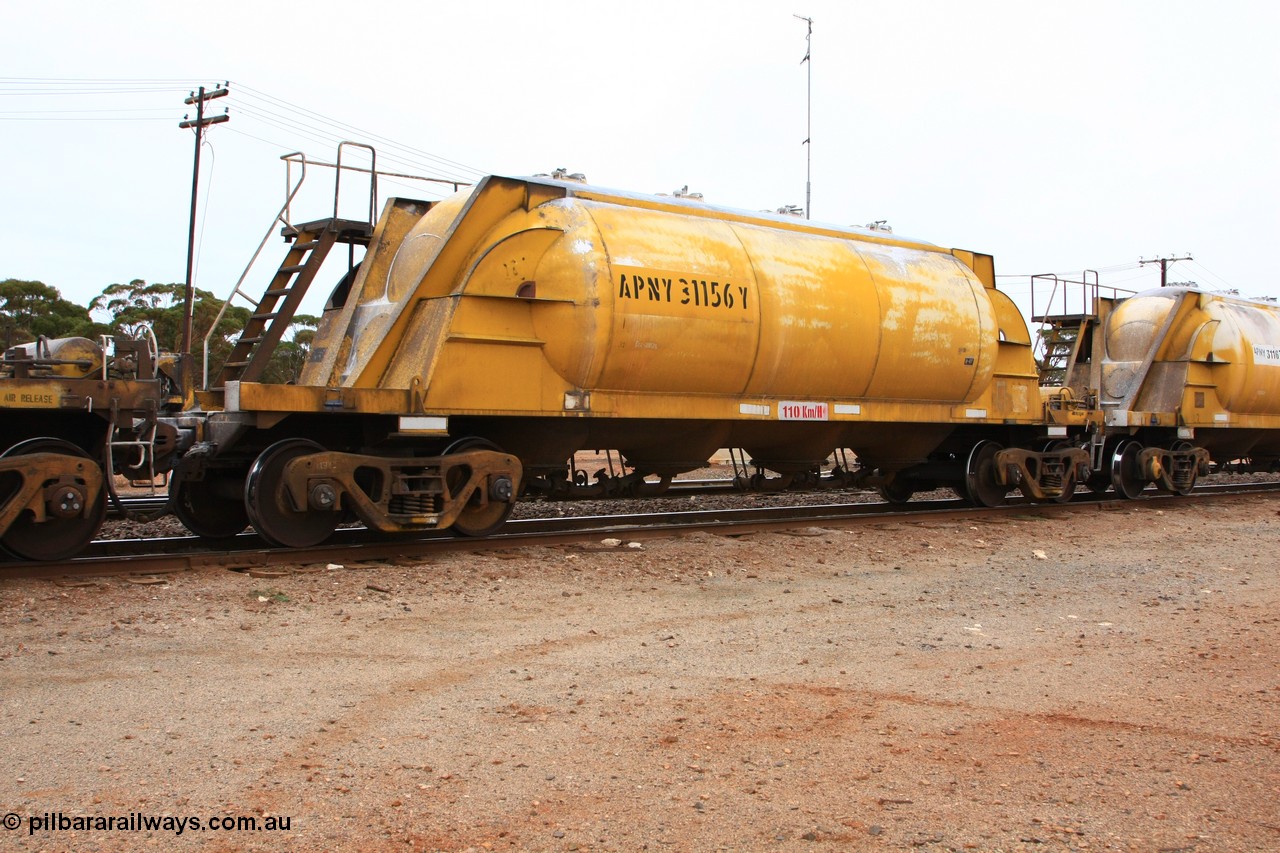 100605 9113
Parkeston, APNY 31156, one of twelve built by WAGR Midland Workshops in 1974 as WNA type pneumatic discharge nickel concentrate waggon, WAGR built and owned copies of the AE Goodwin built WN waggons for WMC.
Keywords: APNY-type;APNY31156;WAGR-Midland-WS;WNA-type;