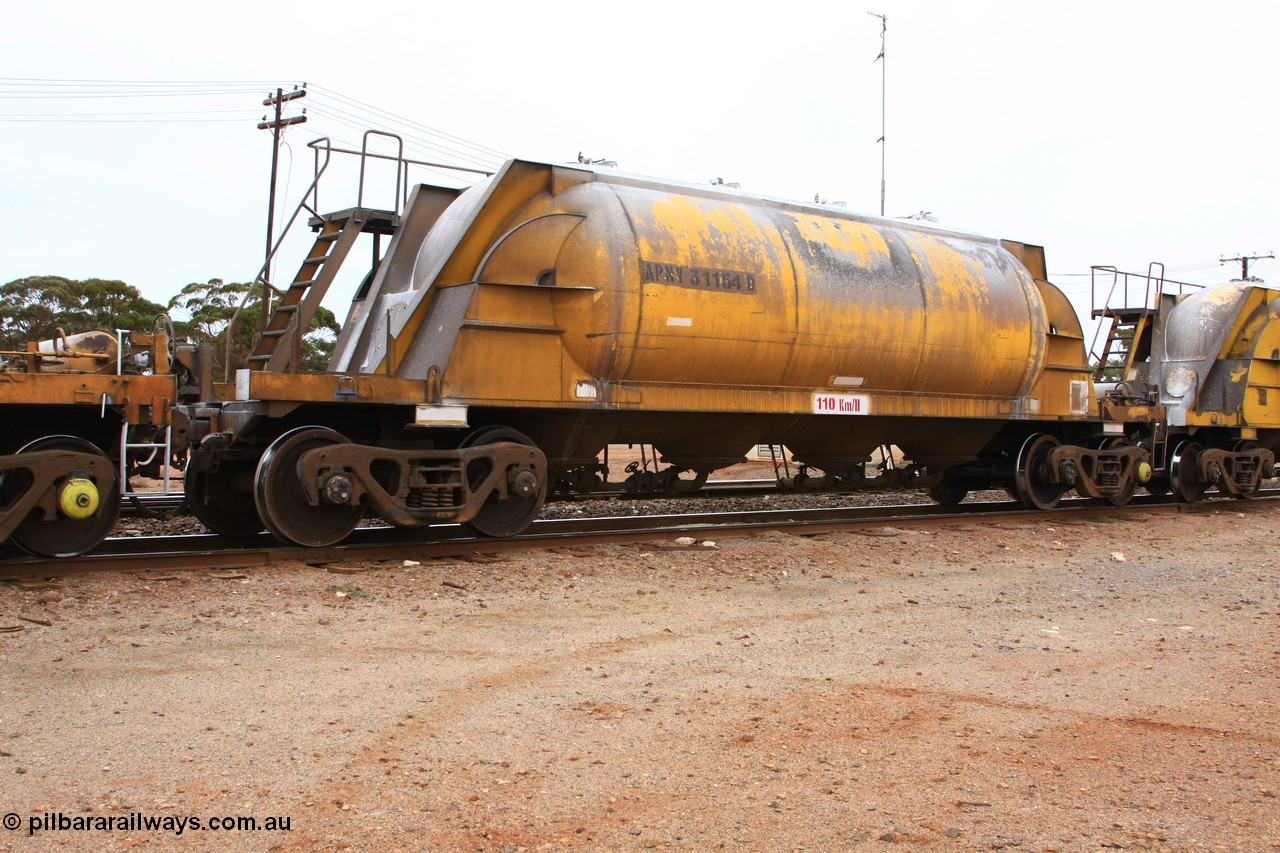 100605 9115
Parkeston, APNY 31154, one of twelve built by WAGR Midland Workshops in 1974 as WNA type pneumatic discharge nickel concentrate waggon, WAGR built and owned copies of the AE Goodwin built WN waggons for WMC.
Keywords: APNY-type;APNY31154;WAGR-Midland-WS;WNA-type;