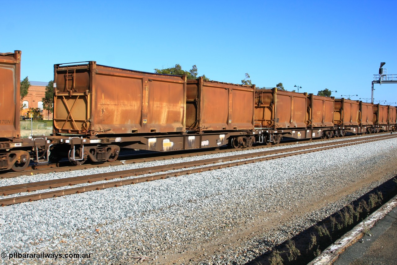 100608 9712
Midland, AQNY 32204, one of sixty two waggons built by Goninan WA in 1998 as WQN type for Murrin Murrin container traffic, with sulphur skips S81A with a replacement lower door and roll top tarpaulin and S90W in original condition on train 2430 empty Malcolm freighter.
Keywords: AQNY-type;AQNY32204;Goninan-WA;WQN-type;