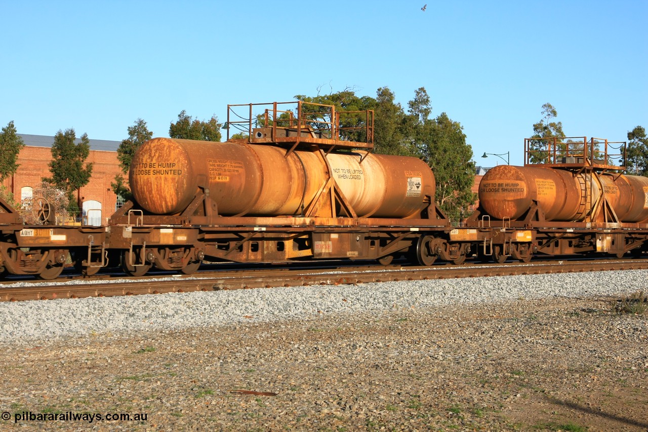 100609 09928
Midland, AQHY 30089 with sulphuric acid tank CSA 0038, originally built by the WAGR Midland Workshops in 1964/66 as a WF type flat waggon, then in 1997, following several recodes and modifications, was one of seventy five waggons converted to the WQH type to carry CSA sulphuric acid tanks between Hampton/Kalgoorlie and Perth/Kwinana.
Keywords: AQHY-type;AQHY30089;WAGR-Midland-WS;WF-type;WFDY-type;WFDF-type;RFDF-type;WQH-type;