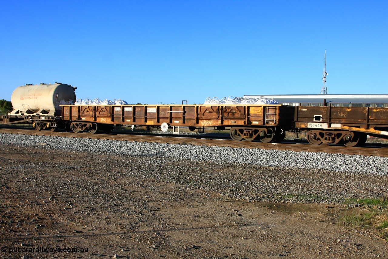 100609 09949
Midland, AOXY 33221, converted to carry nickel matte bulk bags, in WGL traffic. Built by WAGR Midland Workshops in 1973 as part of a batch of twenty five WGX type open waggons, in 1981 to WOAX, then AOAY type.
Keywords: AOXY-type;AOXY33221;WAGR-Midland-WS;WGX-type;WOAX-type;