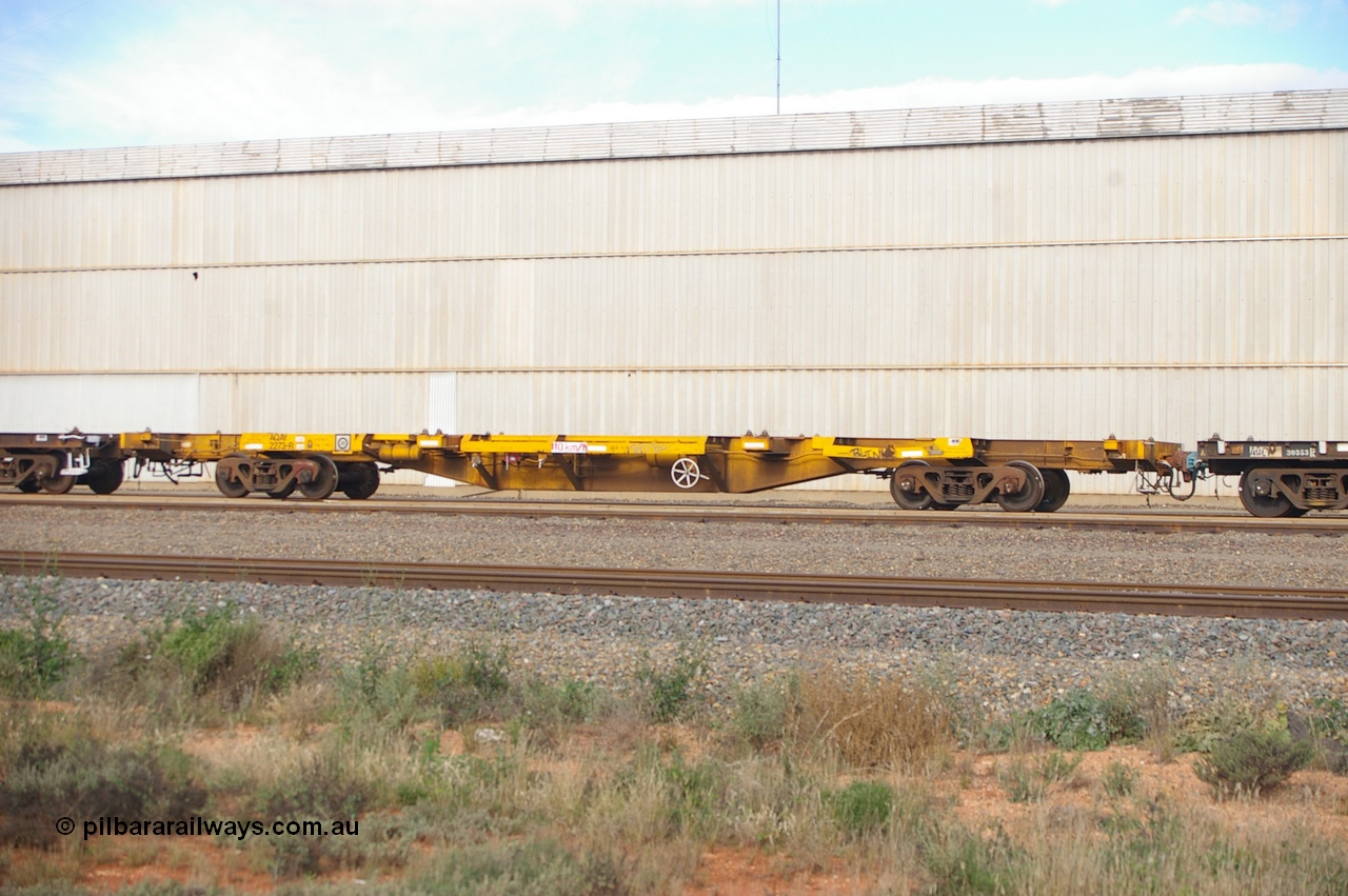 110709 7419 PD
West Kalgoorlie, AQAY 2273, this orphan waggon started life as a Comeng Vic built GOX type open waggon for Commonwealth Railways in 1970, then coded AOOX. Under AWR ownership is was reduced to this 3 TEU unit container skeletal waggon. Peter Donaghy image.
Keywords: Peter-D-Image;AQAY-type;AQAY2273;Comeng-Vic;GOX-type;AOOX-type;ROOX-type;ROKX-type;