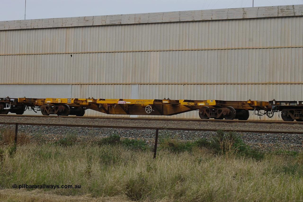 110710 7420 PD
West Kalgoorlie, AQAY 2273, this orphan waggon started life as a Comeng Vic built GOX type open waggon for Commonwealth Railways in 1970, then coded AOOX. Under AWR ownership is was reduced to this 3 TEU unit container skeletal waggon. Peter Donaghy image.
Keywords: Peter-D-Image;AQAY-type;AQAY2273;Comeng-Vic;GOX-type;AOOX-type;ROOX-type;ROKX-type;