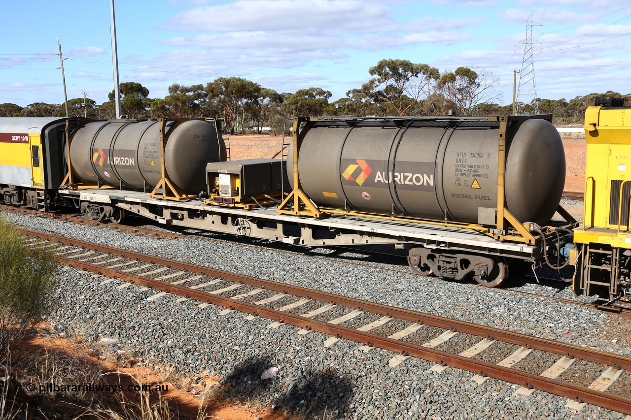 160525 4943
West Kalgoorlie, Aurizon intermodal train 2MP1. Inline fuelling waggon QQFY 4271, originally built for Commonwealth Railways in 1976 by Perry Engineering SA as type RMX, recoded to AQMX, 70 tonne bogies became AQMY, then RQMY, to QR National in 2007. Seen here with two 30' diesel fuel tanktainers from Nantong Tank Container Company, NTTU 330006 and NTTU 330001 each with a 30800 litre capacity, and fuel transfer or pump unit QRIP 06.
Keywords: QQFY-type;QQFY4271;Perry-Engineering-SA;RMX-type;AQMX-type;AQMY-type;RQMY-type;