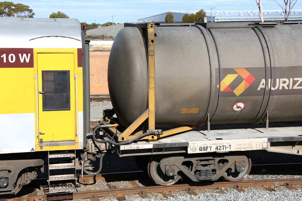 160525 4952
West Kalgoorlie, Aurizon intermodal train 2MP1. Inline fuelling waggon QQFY 4271, originally built for Commonwealth Railways in 1976 by Perry Engineering SA as type RMX, recoded to AQMX, with 70 tonne bogies became AQMY, then RQMY, to QR National in 2007. Seen here with a 30' diesel fuel tanktainer from Nantong Tank Container Company, NTTU 330001 with a 30800 litre capacity. The Perry Engineering plate is also visible.
Keywords: QQFY-type;QQFY4271;Perry-Engineering-SA;RMX-type;AQMX-type;AQMY-type;RQMY-type;