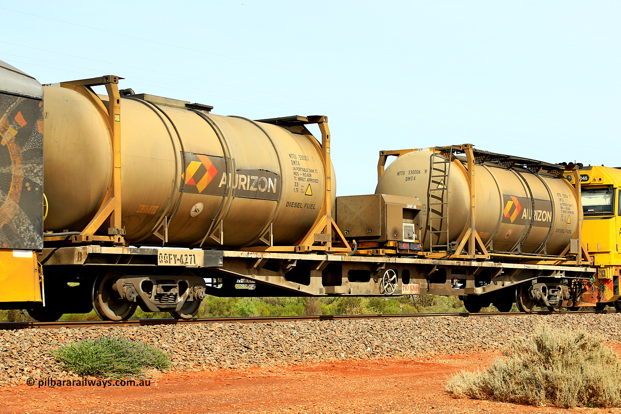 231020 8143
Parkeston, inline fuelling waggon QQFY 4271, originally built for Commonwealth Railways in 1976 by Perry Engineering SA as type RMX, recoded to AQMX, 70 tonne bogies became AQMY, then RQMY, to QR National in 2007. Seen here with two 30' diesel fuel DMT4 type tanktainers from Nantong Tank Container Company, NTTU 330001[1] and NTTU 330006[9] each with a 30800 litre capacity, and fuel transfer or pump unit QRIP 06. In service on Aurizon's Tronox mineral sands train 4UP1 from Ivanhoe / Broken Hill (NSW) to Kwinana (WA). 20th of October 2023.
Keywords: QQFY-type;QQFY4271;Perry-Engineering-SA;RMX-type;AQMX-type;AQMY-type;RQMY-type;