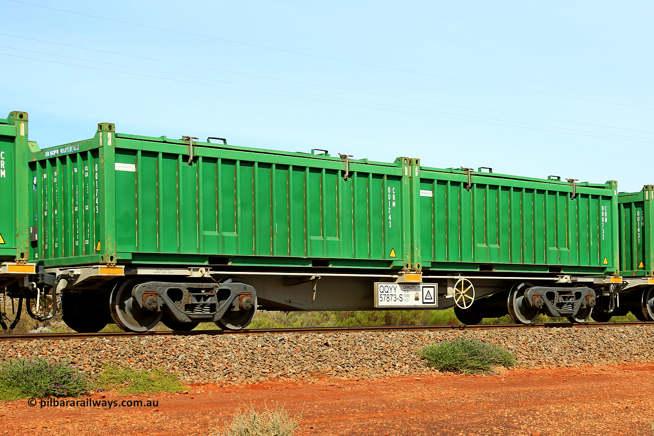 231020 8151
Parkeston, QQYY type 40' container waggon QQYY 57873 one of five hundred ordered by Aurizon and built by CRRC Yangtze Group of China in 2022. In service with two loaded 20' half height hard top 'rotainers' lettered CRM, for Cristal Mining before they were absorbed into Tronox, CRM 000732 with Tronox decal and CRM 001743 with Cristal decal, on Aurizon's Tronox mineral sands train 4UP1 from Ivanhoe / Broken Hill (NSW) to Kwinana (WA). 20th of October 2023.
Keywords: QQYY-type;QQYY57873;CRRC-Yangtze-Group-China;