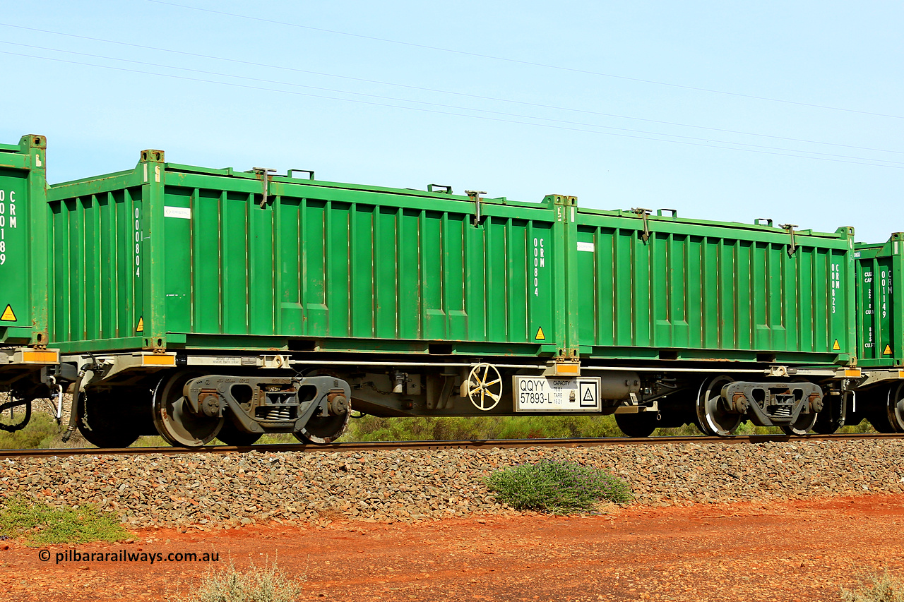 231020 8155
Parkeston, QQYY type 40' container waggon QQYY 57893 one of five hundred ordered by Aurizon and built by CRRC Yangtze Group of China in 2022. In service with two loaded 20' half height hard top 'rotainers' lettered CRM, for Cristal Mining before they were absorbed into Tronox, CRM 000823 with Cristal decal and CRM 000804 with Cristal decal, on Aurizon's Tronox mineral sands train 4UP1 from Ivanhoe / Broken Hill (NSW) to Kwinana (WA). 20th of October 2023.
Keywords: QQYY-type;QQYY57893;CRRC-Yangtze-Group-China;