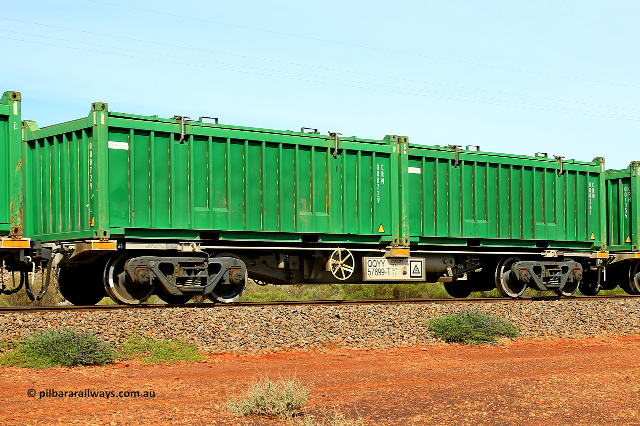 231020 8161
Parkeston, QQYY type 40' container waggon QQYY 57899 one of five hundred ordered by Aurizon and built by CRRC Yangtze Group of China in 2022. In service with two loaded 20' half height hard top 'rotainers' lettered CRM, for Cristal Mining before they were absorbed into Tronox, CRM 000261 with Cristal decal and CRM 000729 with Cristal decal, on Aurizon's Tronox mineral sands train 4UP1 from Ivanhoe / Broken Hill (NSW) to Kwinana (WA). 20th of October 2023.
Keywords: QQYY-type;QQYY57899;CRRC-Yangtze-Group-China;