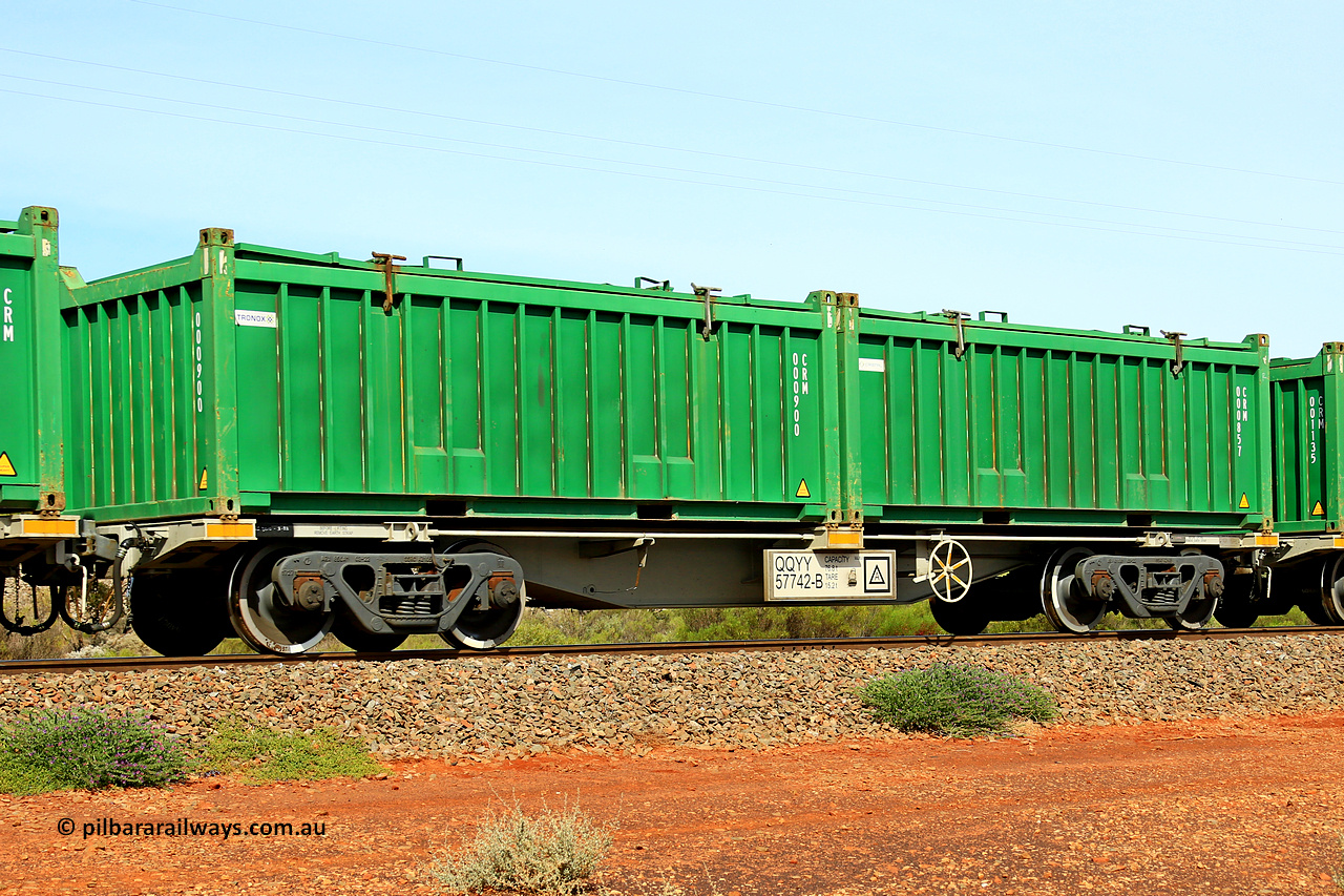 231020 8165
Parkeston, QQYY type 40' container waggon QQYY 57742 one of five hundred ordered by Aurizon and built by CRRC Yangtze Group of China in 2022. In service with two loaded 20' half height hard top 'rotainers' lettered CRM, for Cristal Mining before they were absorbed into Tronox, CRM 000857 with Cristal decal and CRM 000900 with Tronox decal, on Aurizon's Tronox mineral sands train 4UP1 from Ivanhoe / Broken Hill (NSW) to Kwinana (WA). 20th of October 2023.
Keywords: QQYY-type;QQYY57742;CRRC-Yangtze-Group-China;