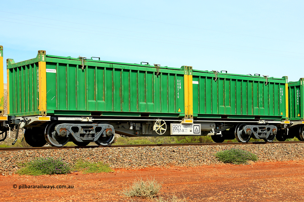 231020 8168
Parkeston, QQYY type 40' container waggon QQYY 57757 one of five hundred ordered by Aurizon and built by CRRC Yangtze Group of China in 2022. In service with two loaded 20' half height hard top 'rotainers' lettered CRM, for Cristal Mining before they were absorbed into Tronox, CRM 001405 with Cristal decal and yellow corner posts and CRM 000740 with Tronox decal and yellow corner posts, on Aurizon's Tronox mineral sands train 4UP1 from Ivanhoe / Broken Hill (NSW) to Kwinana (WA). 20th of October 2023.
Keywords: QQYY-type;QQYY57757;CRRC-Yangtze-Group-China;