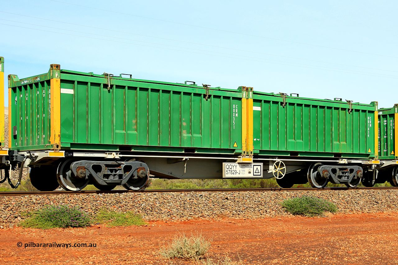 231020 8172
Parkeston, QQYY type 40' container waggon QQYY 57829 one of five hundred ordered by Aurizon and built by CRRC Yangtze Group of China in 2022. In service with two loaded 20' half height hard top 'rotainers' lettered CRM, for Cristal Mining before they were absorbed into Tronox, CRM 001634 with Cristal decal and yellow corner posts and CRM 000351 with Cristal decal and yellow corner posts, on Aurizon's Tronox mineral sands train 4UP1 from Ivanhoe / Broken Hill (NSW) to Kwinana (WA). 20th of October 2023.
Keywords: QQYY-type;QQYY57829;CRRC-Yangtze-Group-China;