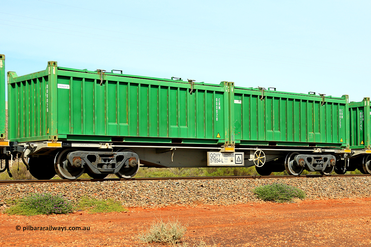 231020 8182
Parkeston, QQYY type 40' container waggon QQYY 57854 one of five hundred ordered by Aurizon and built by CRRC Yangtze Group of China in 2022. In service with two loaded 20' half height hard top 'rotainers' lettered CRM, for Cristal Mining before they were absorbed into Tronox, CRM 000227 with Cristal decal and CRM 000028 with Tronox decal, on Aurizon's Tronox mineral sands train 4UP1 from Ivanhoe / Broken Hill (NSW) to Kwinana (WA). 20th of October 2023.
Keywords: QQYY-type;QQYY57854;CRRC-Yangtze-Group-China;