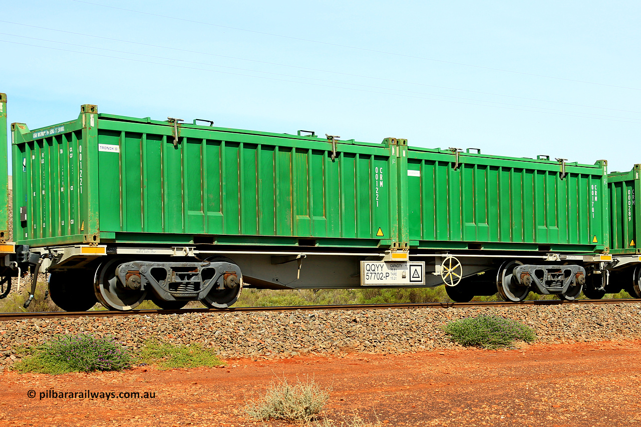 231020 8199
Parkeston, QQYY type 40' container waggon QQYY 57702 one of five hundred ordered by Aurizon and built by CRRC Yangtze Group of China in 2022. In service with two loaded 20' half height hard top 'rotainers' lettered CRM, for Cristal Mining before they were absorbed into Tronox, CRM 001701 with Cristal decal and CRM 001221 with Tronox decal, on Aurizon's Tronox mineral sands train 4UP1 from Ivanhoe / Broken Hill (NSW) to Kwinana (WA). 20th of October 2023.
Keywords: QQYY-type;QQYY57702;CRRC-Yangtze-Group-China;