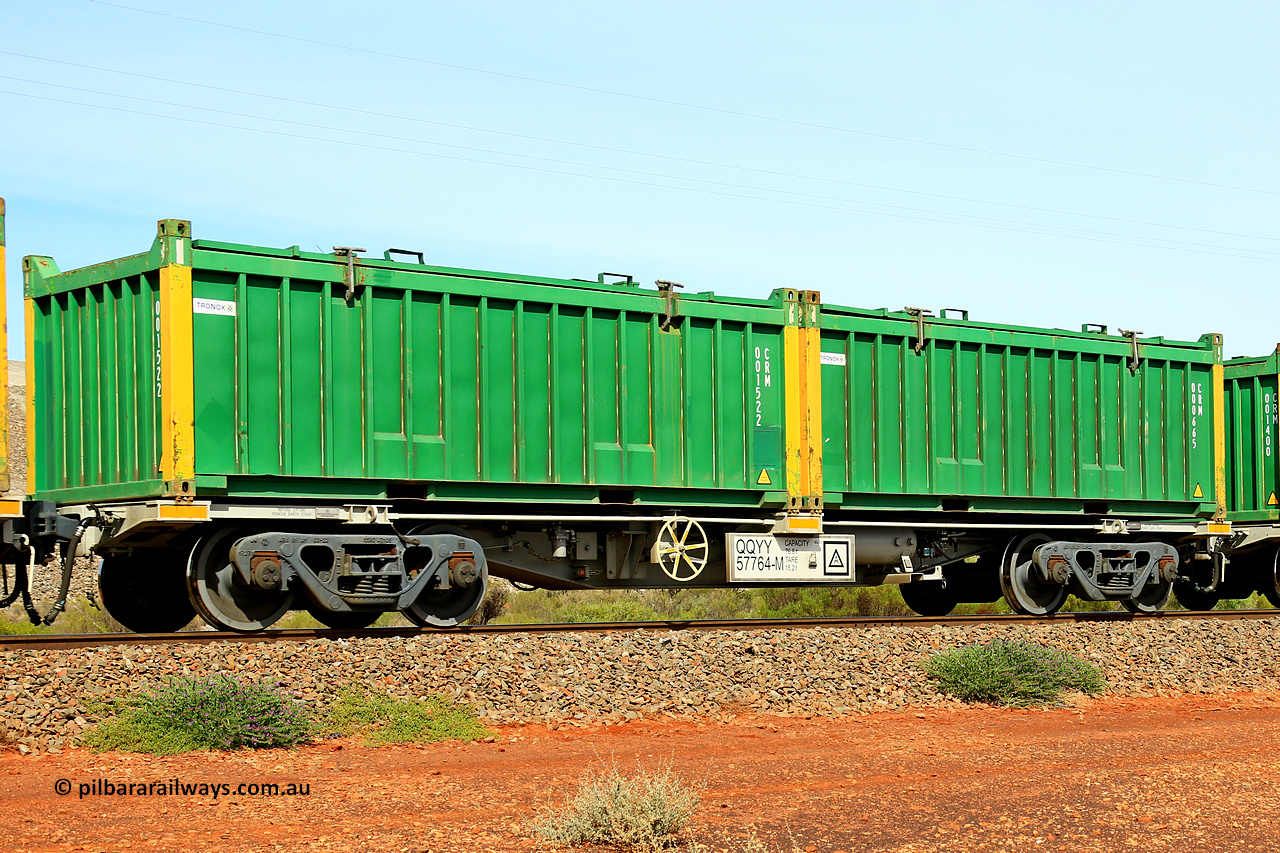 231020 8209
Parkeston, QQYY type 40' container waggon QQYY 57764 one of five hundred ordered by Aurizon and built by CRRC Yangtze Group of China in 2022. In service with two loaded 20' half height hard top 'rotainers' lettered CRM, for Cristal Mining before they were absorbed into Tronox, CRM 000665 with Tronox decal and yellow corner posts and CRM 001522 with Tronox decal and yellow corner posts, on Aurizon's Tronox mineral sands train 4UP1 from Ivanhoe / Broken Hill (NSW) to Kwinana (WA). 20th of October 2023.
Keywords: QQYY-type;QQYY57764;CRRC-Yangtze-Group-China;