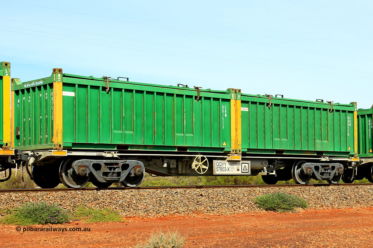 231020 8210
Parkeston, QQYY type 40' container waggon QQYY 57803 one of five hundred ordered by Aurizon and built by CRRC Yangtze Group of China in 2022. In service with two loaded 20' half height hard top 'rotainers' lettered CRM, for Cristal Mining before they were absorbed into Tronox, CRM 000578 with Tronox decal and yellow corner posts and CRM 001513 with Cristal decal and yellow corner posts, on Aurizon's Tronox mineral sands train 4UP1 from Ivanhoe / Broken Hill (NSW) to Kwinana (WA). 20th of October 2023.
Keywords: QQYY-type;QQYY57803;CRRC-Yangtze-Group-China;