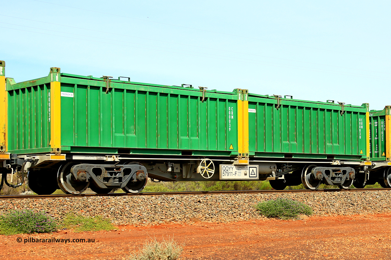 231020 8217
Parkeston, QQYY type 40' container waggon QQYY 57911 one of five hundred ordered by Aurizon and built by CRRC Yangtze Group of China in 2022. In service with two loaded 20' half height hard top 'rotainers' lettered CRM, for Cristal Mining before they were absorbed into Tronox, CRM 000830 with Tronox decal and yellow corner posts and CRM 000039 with Tronox decal and yellow corner posts, on Aurizon's Tronox mineral sands train 4UP1 from Ivanhoe / Broken Hill (NSW) to Kwinana (WA). 20th of October 2023.
Keywords: QQYY-type;QQYY57911;CRRC-Yangtze-Group-China;